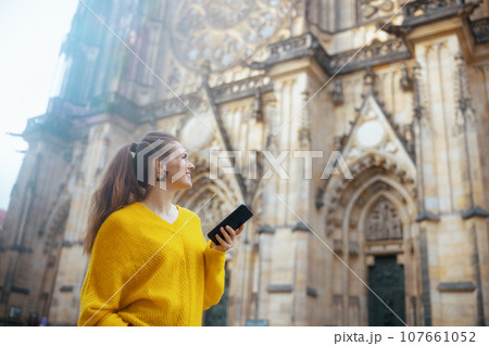 woman in Prague Czech Republic having walking tour and walking woman in Prague Czech Republic having walking tour and walking 107661052