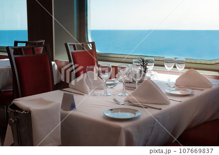 Restaurant on the ship overlooking the sea. A cruise ship Restaurant on the ship overlooking the sea. A cruise ship 107669837