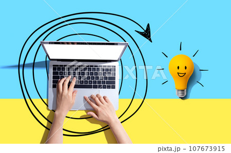 Creativity, inspiration, idea concept with light bulb and laptop computer Creativity, inspiration, idea concept with light bulb and laptop computer 107673915