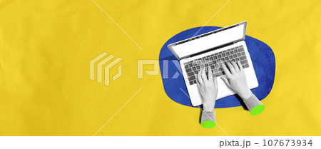 Person using a laptop computer Person using a laptop computer 107673934