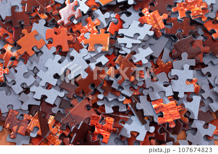 Mixed Jigsaw Puzzle Peaces Background Mixed Jigsaw Puzzle Peaces Background 107674823