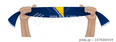 3D Flag on ribbon in hand 3D Flag on ribbon in hand 107680434