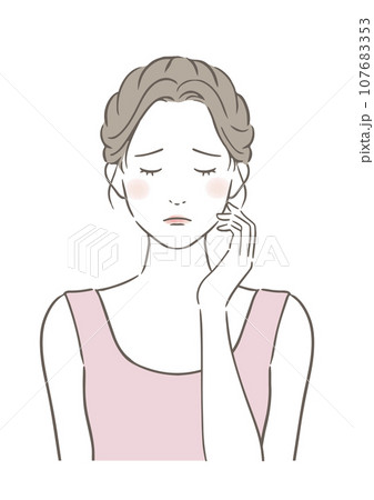 頬に手をあてて悩んでいる女性 頬に手をあてて悩んでいる女性 107683353