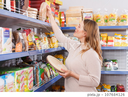 woman customer choosing wafers 107684126