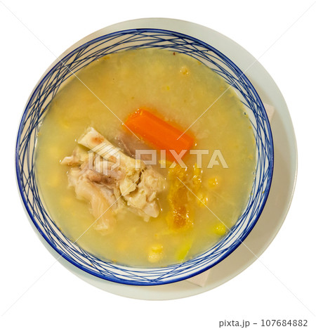 Boiled chickpeas served with meat on platter 107684882