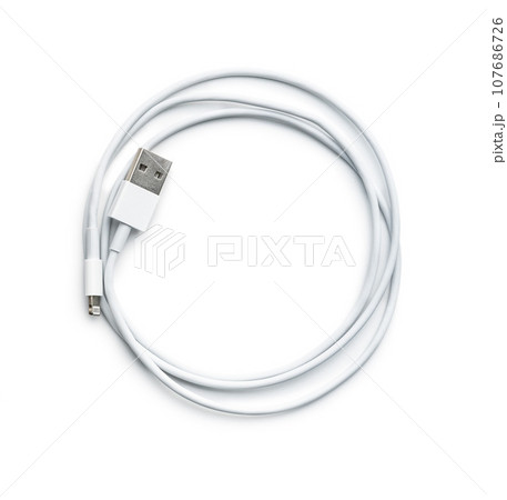 White usb charging cables isolated on white background. White usb charging cables isolated on white background. 107686726