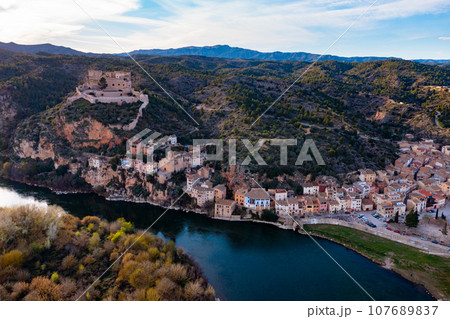 Catalan town of Miravet on banks of Ebro river, Tarragona, Spain 107689837