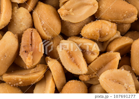 large amount of peeled salted peanuts large amount of peeled salted peanuts 107691277