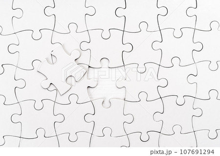 White jigsaw puzzle 107691294