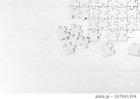 Puzzle game pieces 107691304