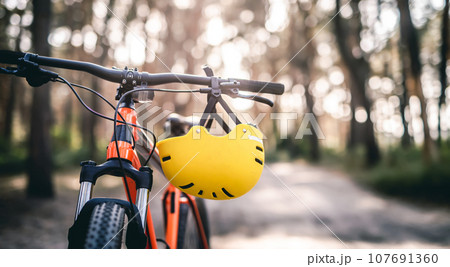 Bicycle and helmet on handlebar 107691360