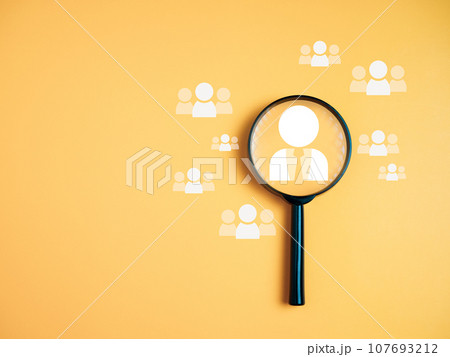 Team management concepts, human resources, recruitment concepts, human resource management or human resource management concept, Manager icon in magnifying glass placed on yellow background. Team management concepts, human resources, recruitment concepts, human resource management or human resource management concept, Manager icon in magnifying glass placed on yellow background. 107693212