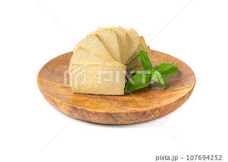 Tofu Cheese Isolated, Smoked Vegan Cheese Slice, Sliced Soya Bean Curd, Soy Protein or TSP 107694252
