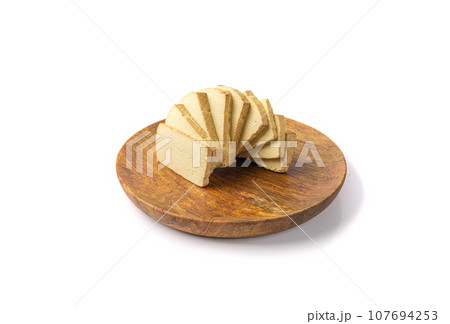 Tofu Cheese Isolated, Smoked Vegan Cheese Slice, Sliced Soya Bean Curd, Soy Protein or TSP 107694253