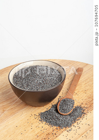Poppy Seed, Blue Poppyseed Pile, Small Culinary Grains, Tiny Seeds, Oilseed Sprinkles Poppy Seed, Blue Poppyseed Pile, Small Culinary Grains, Tiny Seeds, Oilseed Sprinkles 107694705