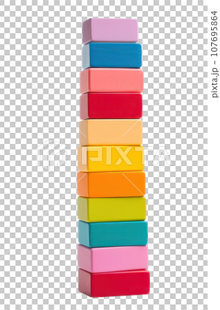 Colorful blocks stacked high in a tower, ready to topple isolated Colorful blocks stacked high in a tower, ready to topple isolated 107695864