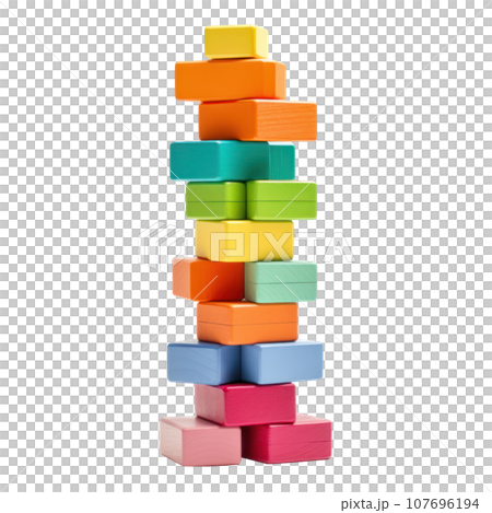 Colorful blocks stacked high in a tower, ready to topple isolated 107696194