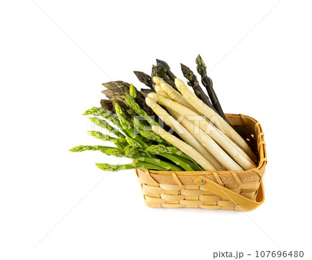 Raw Garden Asparagus Mix Bunches Isolated, Fresh Green Spring Vegetables in Basket Raw Garden Asparagus Mix Bunches Isolated, Fresh Green Spring Vegetables in Basket 107696480