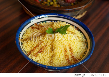 Moroccan Couscous Bowl, Traditional Cuscus, Moroccan Bulgur, Healthy Arabic Food, Moroccan Couscous Moroccan Couscous Bowl, Traditional Cuscus, Moroccan Bulgur, Healthy Arabic Food, Moroccan Couscous 107696540