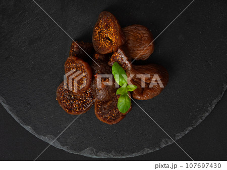 Dry Fig, Dried Ficus Carica Fruit, Sweet Healthy Diet, Tropical Dessert, Wrinkled Dehydrated Snack Dry Fig, Dried Ficus Carica Fruit, Sweet Healthy Diet, Tropical Dessert, Wrinkled Dehydrated Snack 107697430