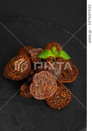 Dry Fig, Dried Ficus Carica Fruit, Sweet Healthy Diet, Tropical Dessert, Wrinkled Dehydrated Snack Dry Fig, Dried Ficus Carica Fruit, Sweet Healthy Diet, Tropical Dessert, Wrinkled Dehydrated Snack 107697432