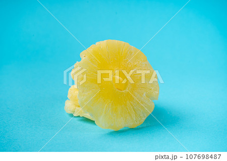 Dry Pineapple Rings Isolated, Candy Pineapples, Dehydrated Yellow Sugar Fruit, Candied Fruits Circles 107698487