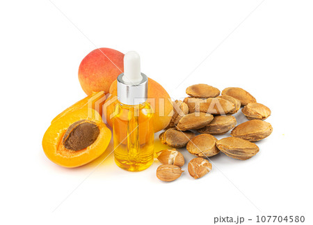 Apricot Kernels Oil Isolated, Apricot Pits Extraction, Fruit Seeds Infusion Apricot Kernels Oil Isolated, Apricot Pits Extraction, Fruit Seeds Infusion 107704580