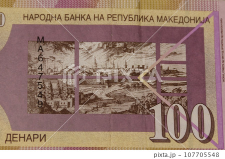 Macro shot of one hundred macedonian denar banknote Macro shot of one hundred macedonian denar banknote 107705548