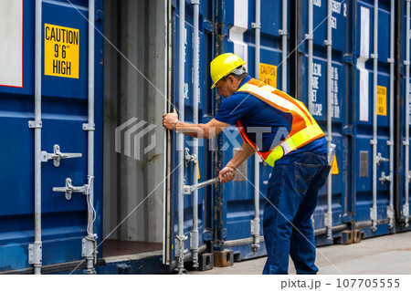 Warehouse engineer worker working at industrial container yard Warehouse engineer worker working at industrial container yard 107705555