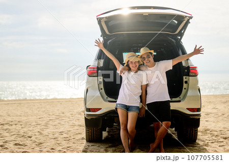 Family travel on beach, Family with car road trip at sea on summer 107705581