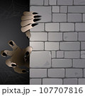 scary hands ghost behind the brick wall 107707816