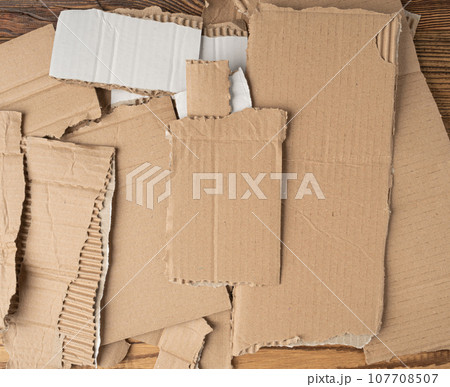 Cardboard Pieces Textured Background, Carton Piece with Copy Space, Ripped Kraft Paper Wallpaper 107708507