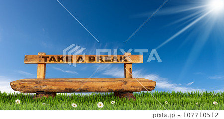 Empty Wooden Bench with Text Take a Break 107710512