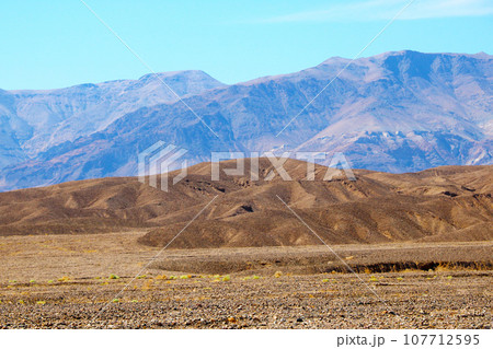 A view of mountains in a haze in a US national park. A view of mountains in a haze in a US national park. 107712595
