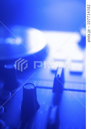 DJ mixing desk turntable 107714382