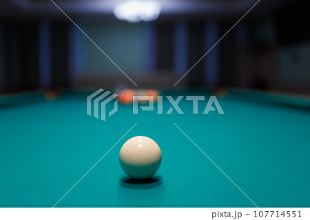 Billiard accessories balls and pyramid on a billiard table 107714551