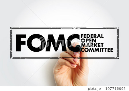 FOMC Federal Open Market Committee acronym - committee within the Federal Reserve System, conducts monetary policy for the U.S. central bank, text concept stamp 107716093