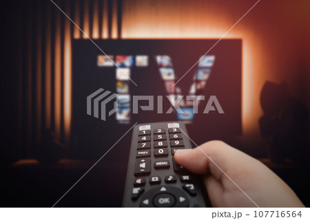 Smart TV, watching television 107716564