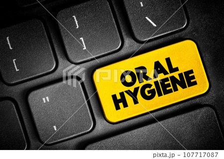 Oral Hygiene is the practice of keeping one's mouth clean and free of disease and other problems, text button on keyboard, concept background Oral Hygiene is the practice of keeping one's mouth clean and free of disease and other problems, text button on keyboard, concept background 107717087
