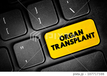 Organ Transplant is a medical procedure in which an organ is removed from one body and placed in the body of a recipient, text button on keyboard, concept background 107717386