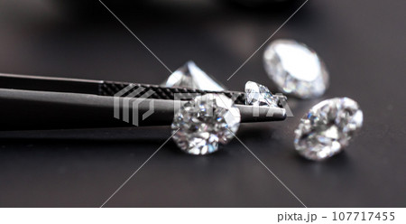 Diamonds on black background Diamonds on black background 107717455