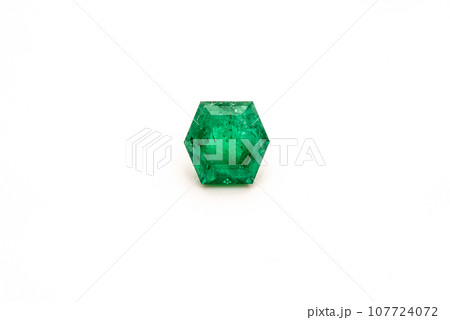 Natural emeralds on white background 107724072