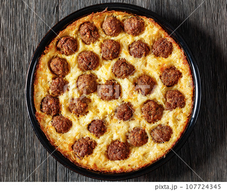 Meatball Hash Brown Casserole in baking dish Meatball Hash Brown Casserole in baking dish 107724345