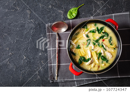 chicken spinach artichoke creamy soup in a pot chicken spinach artichoke creamy soup in a pot 107724347
