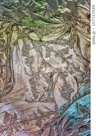 COLORED CUT GLASS TAN AND TURQUOISE GRUNGE BACKGROUND 107725080