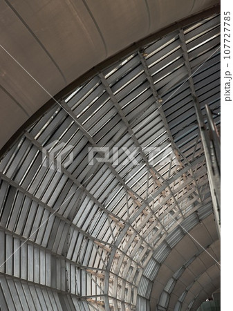 Modern architecture interior design of Metal structure building and glass at Suvarnabhumi Departure Terminal. Modern architecture interior design of Metal structure building and glass at Suvarnabhumi Departure Terminal. 107727785