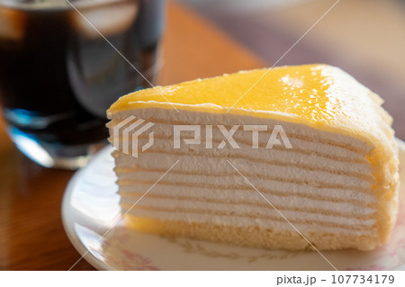 おいしいミルクレープとアイスコーヒー 107734179