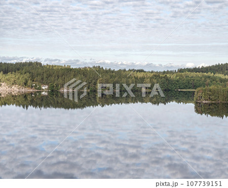 Lake Ragnerudssjoen in Dalsland Sweden beautiful nature forest pinetree swedish houses 107739151