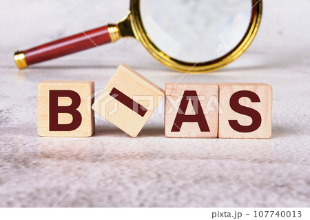 Bias a word written on wooden cubes 107740013