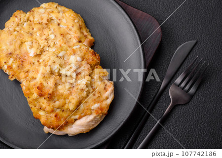 Delicious meat fried with Dijon mustard with salt, spices and herbs 107742186